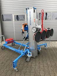 Lève matériaux équipé d'un palonnier à ventouses SUPERLIFTER SLK25